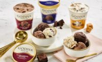 Godiva Ice Cream pints, including salted caramel brownie, midnight swirl, and caramel embrace. Ice cream created with Boardwalk Frozen Treats